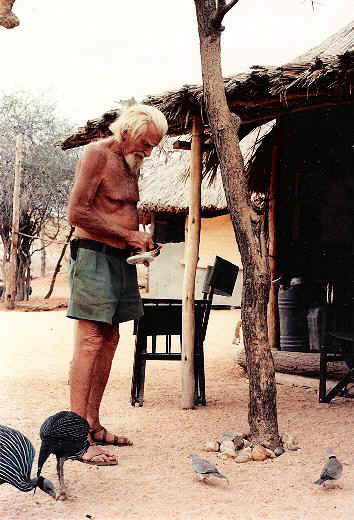 GeorgeAdamson_FeedingGuineaFowl2.jpg (68471 bytes)