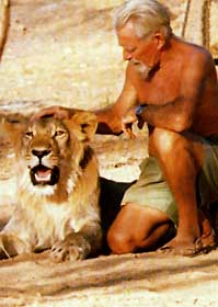 http://www.fatheroflions.org/Photos_AdamsonOnly/Christian_WithGeorge_Color.jpg